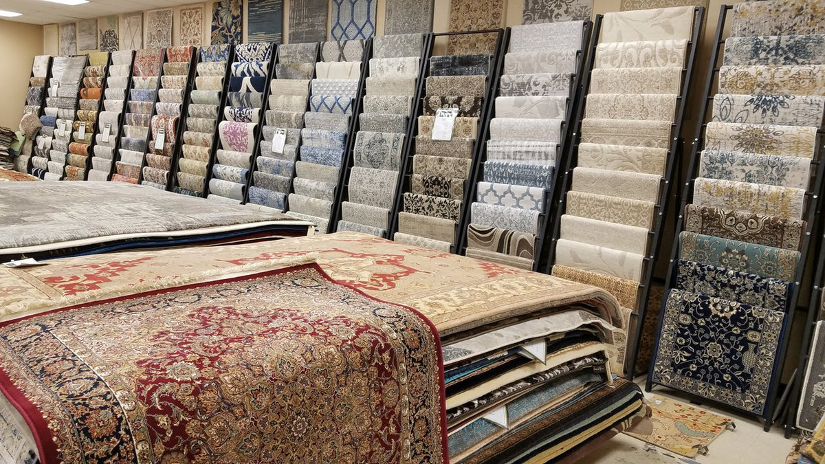 Hundreds of area rug samples in the store to take home and try to see if the colors work in your home decor